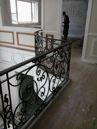 Wrought Iron Stair Railing, Entrance Gate, and False Balcony Railing