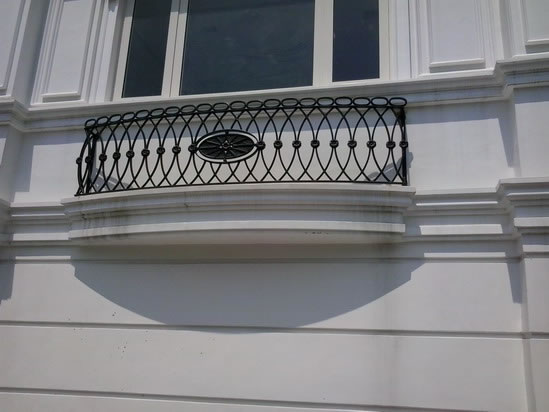 Wrought Iron Stair Railing, Entrance Gate, and False Balcony Railing