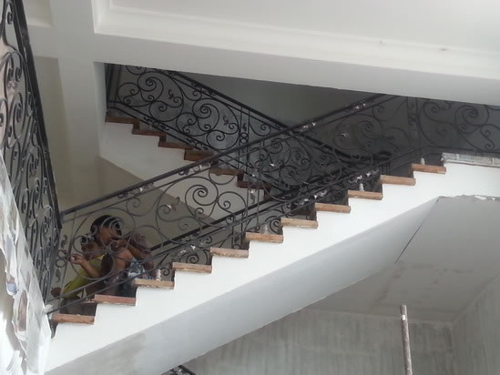 Wrought Iron Stair Railing, Entrance Gate, and False Balcony Railing