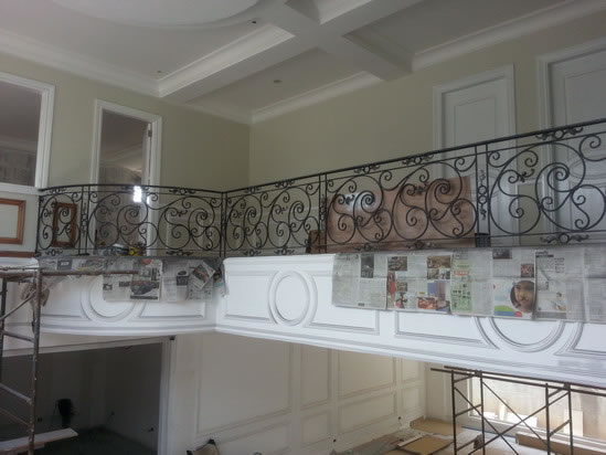 Wrought Iron Stair Railing, Entrance Gate, and False Balcony Railing