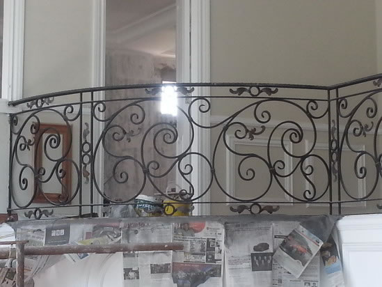 Wrought Iron Stair Railing, Entrance Gate, and False Balcony Railing