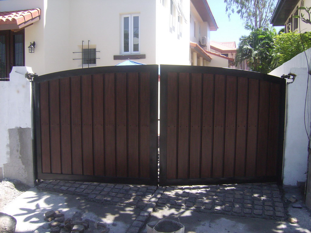 Vehicular Gate in G.I. Sheet Bended and in Wood Finish.