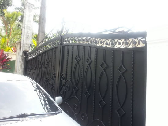 Wrought Iron Stair Railing, Entrance Gate, and False Balcony Railing