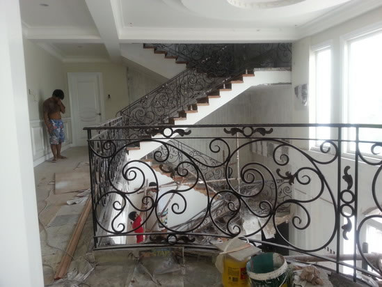 Wrought Iron Stair Railing, Entrance Gate, and False Balcony Railing