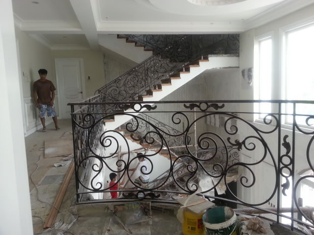 Wrought Iron Stair Railing, Entrance Gate, and False Balcony Railing