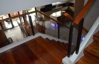 Glass Modern Stair Railing in Wrought Iron Frame