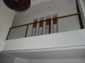 Glass Modern Stair Railing in Wrought Iron Frame